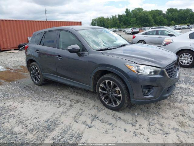  Salvage Mazda Cx